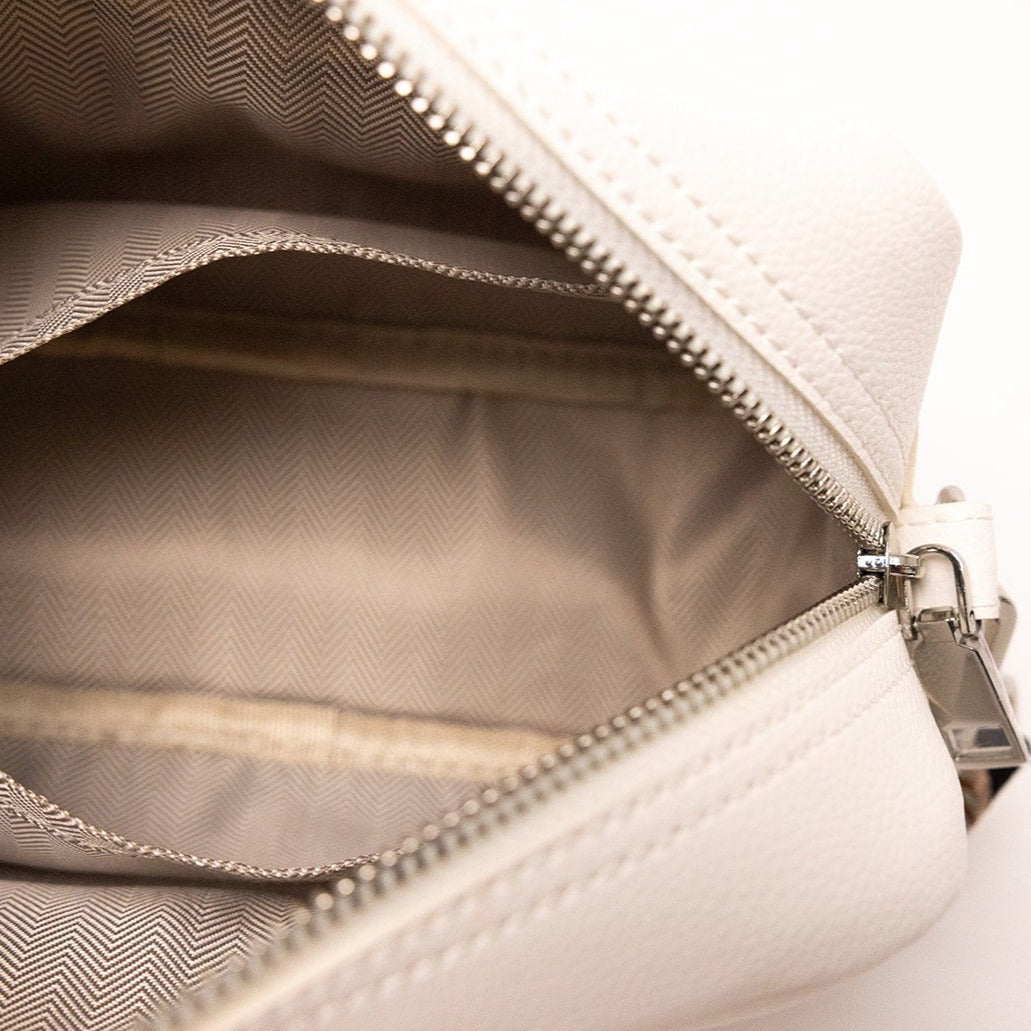 Vegan White Crossbody Bag InteriorWhite Vegan Leather Spacious Crossbody Bag with Chevron Adjustable Guitar Strap
