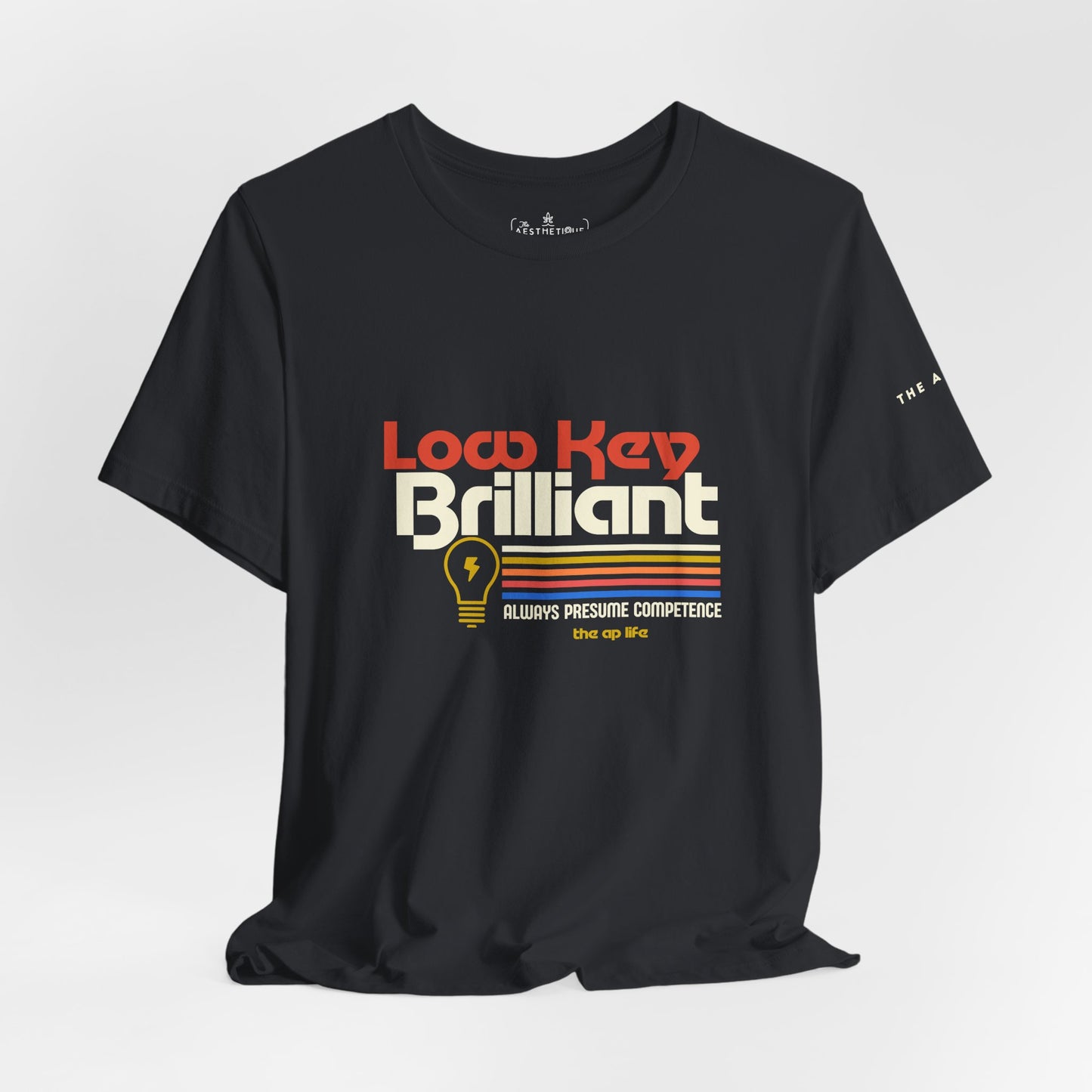 Low Key Brilliant Presume Competence - Adult Unisex Jersey Tee