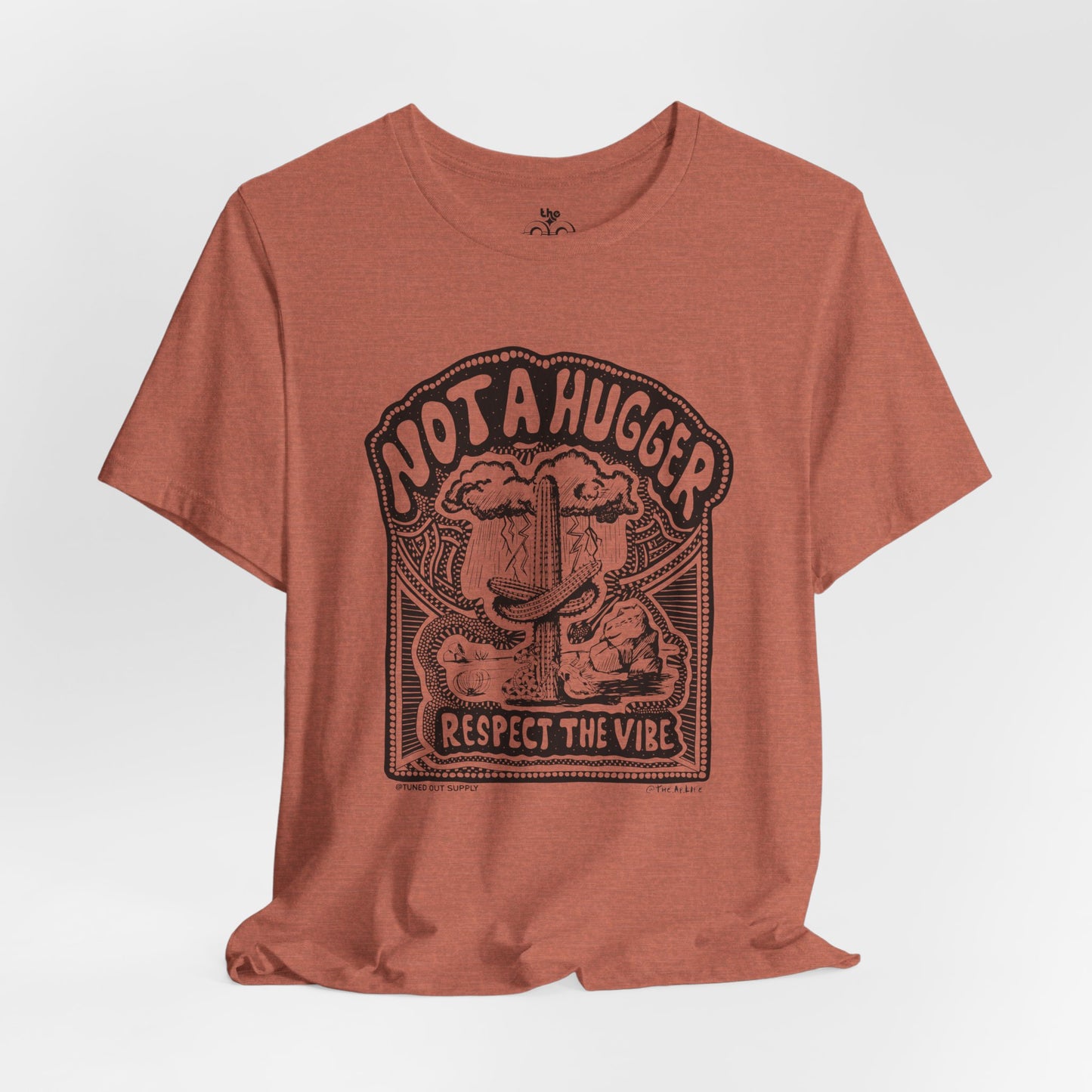 Not A Hugger - Adult Unisex Jersey Short Sleeve Tee - Tuned Out Supply + The AP Life Collab