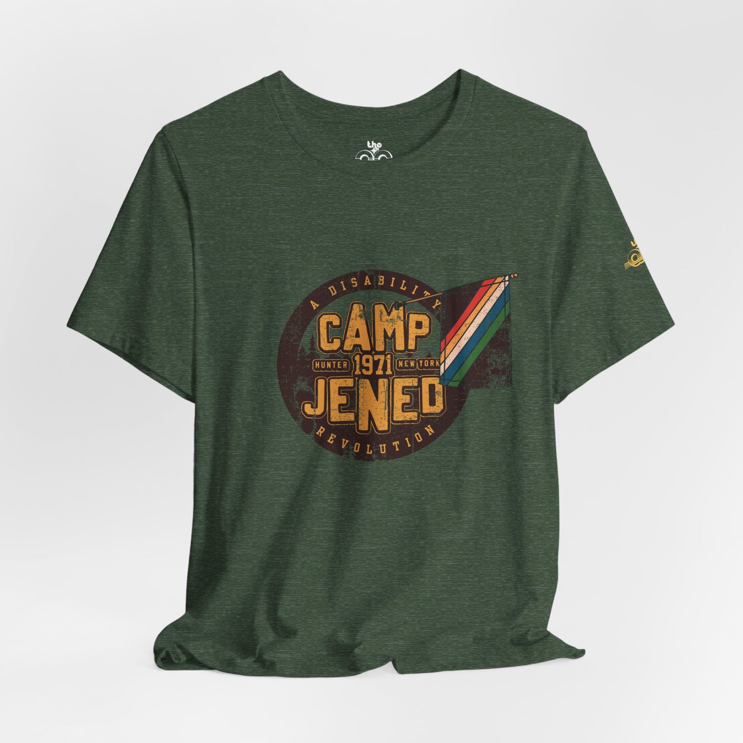 Heathered dark green t-shirt that reads "Camp Jened 1971 Hunter, New York, A Disability Revolution" in brown and gold distressed print, with a disability pride flag coming out from the M, in CAMP.
