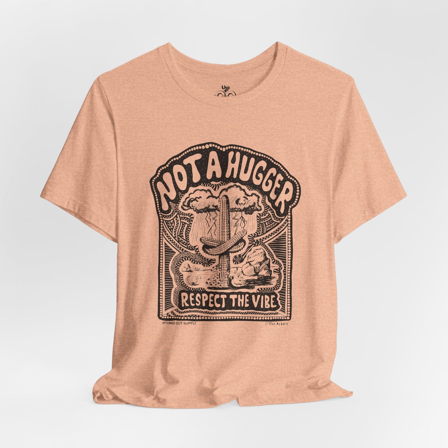 Not A Hugger - Adult Unisex Jersey Short Sleeve Tee - Tuned Out Supply + The AP Life Collab