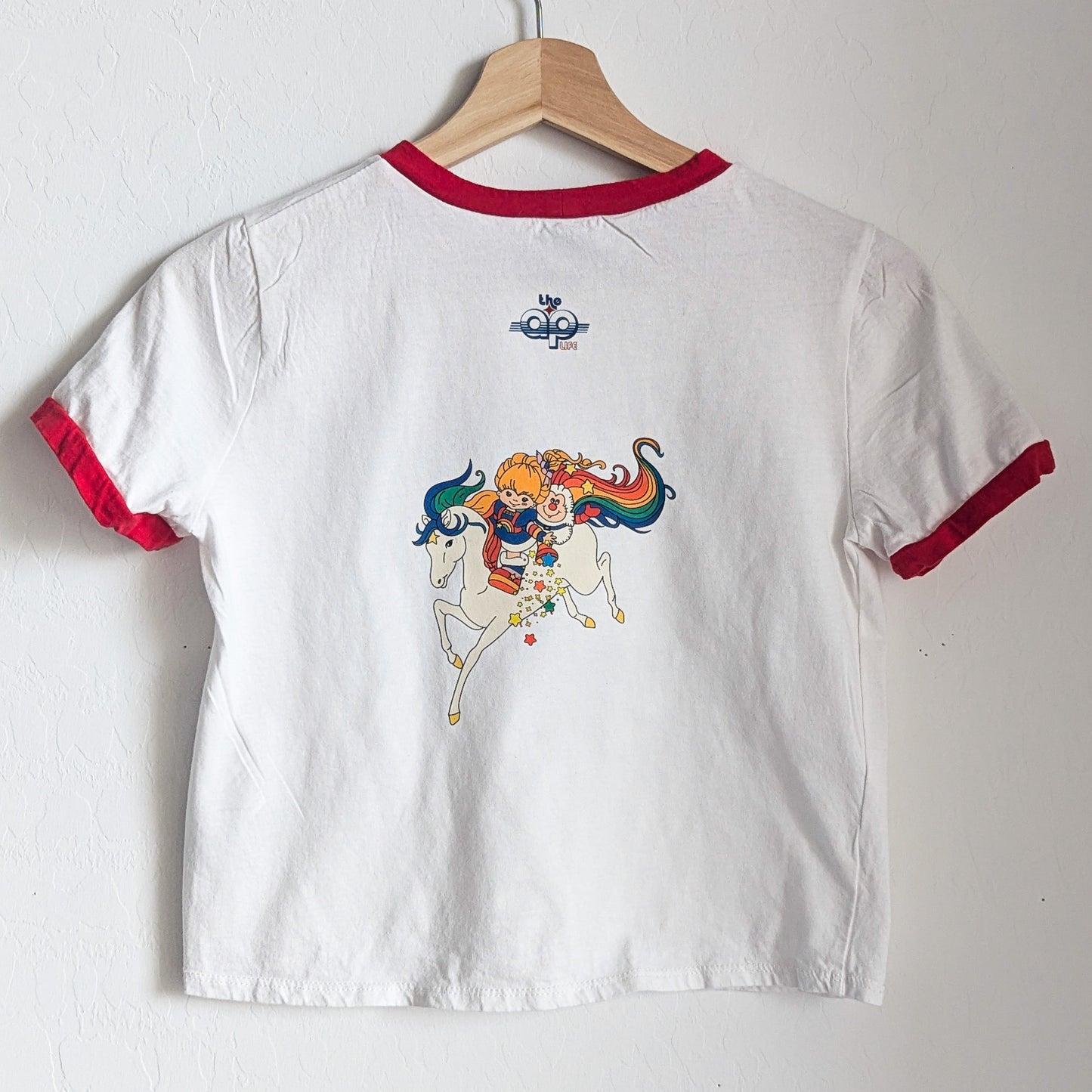 Neurodiversity Spreads Color to the Earth - Women's Rainbow Ringer Baby Tee - Repurposed Rebels