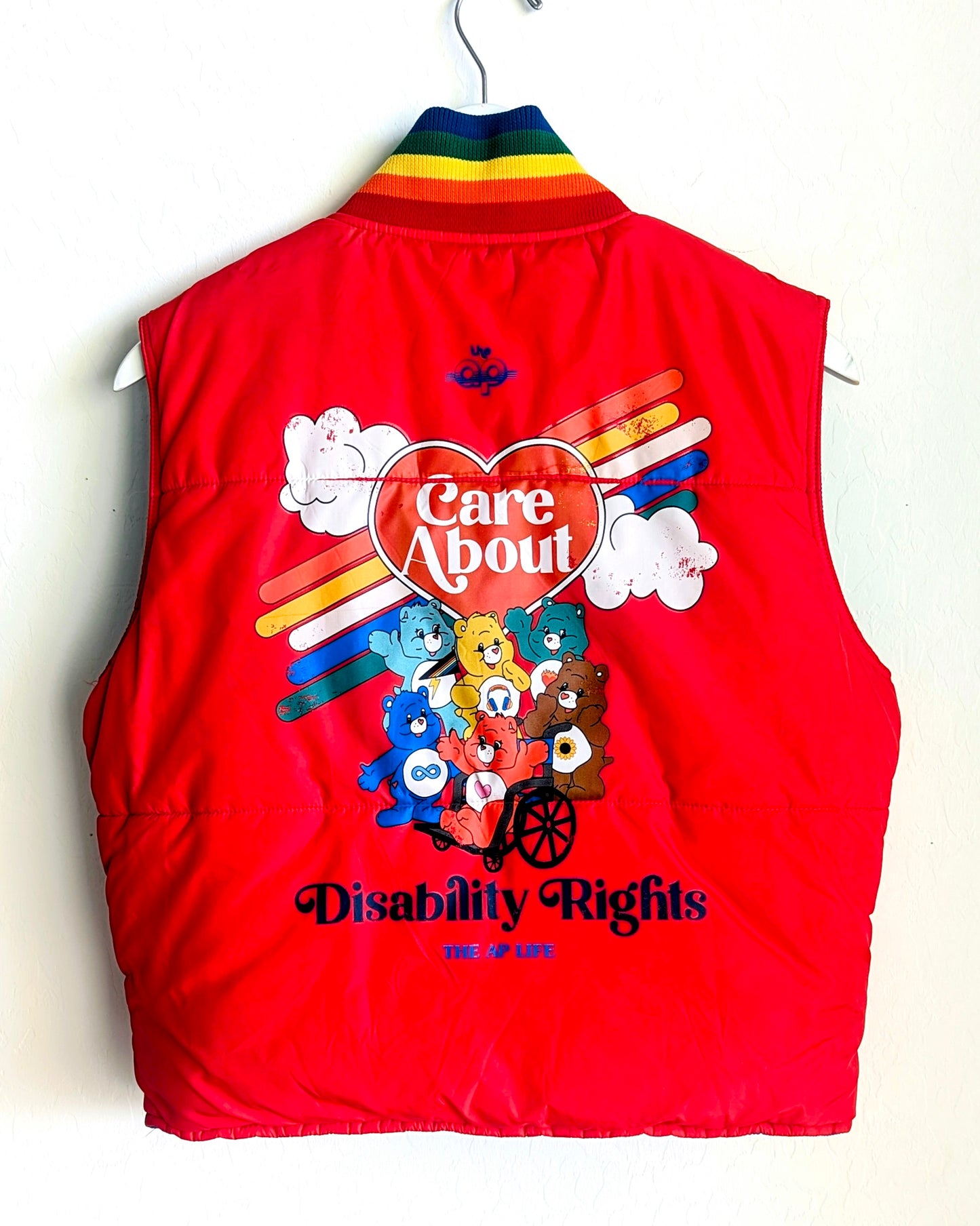 Reversible Rainbow Vest - Care About Disability Rights + Neurodiversity Spreads Color to the Earth - Adult Unisex (M) Puffer Vest - Repurposed Rebels