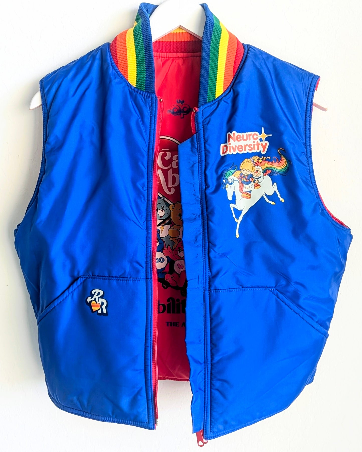 Reversible Rainbow Vest - Care About Disability Rights + Neurodiversity Spreads Color to the Earth - Adult Unisex (M) Puffer Vest - Repurposed Rebels