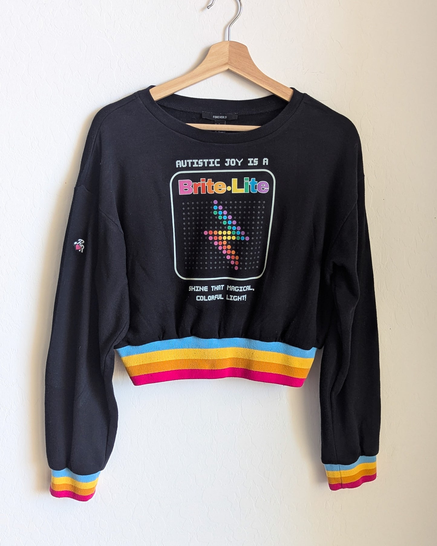 Autism is a Brite Lite - Women's Rainbow Ribbed Cropped Sweatshirt (M) - Repurposed Rebels