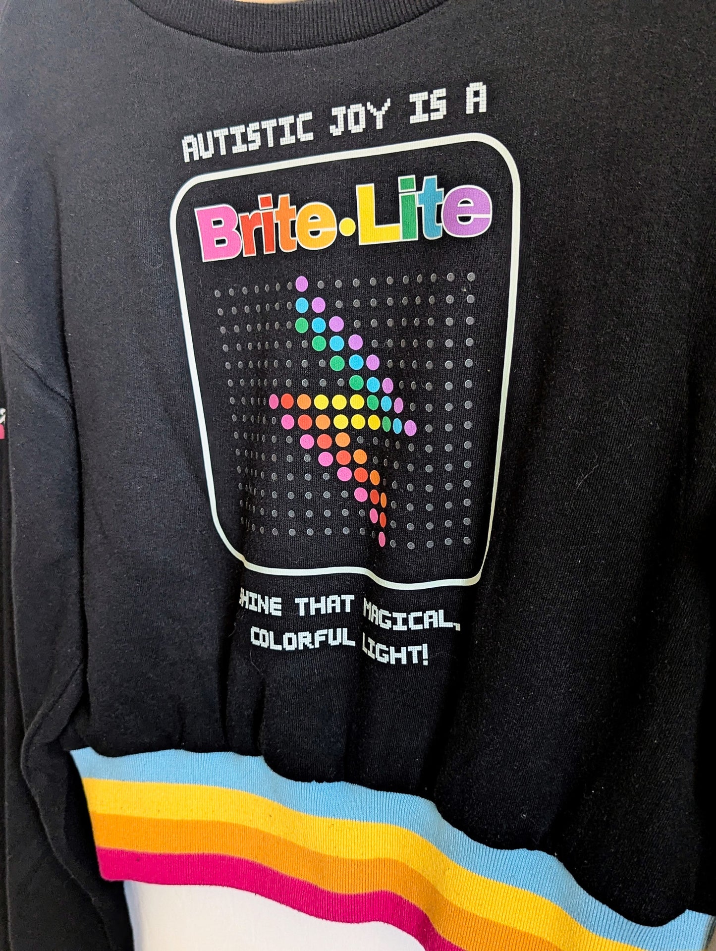 Autism is a Brite Lite - Women's Rainbow Ribbed Cropped Sweatshirt (M) - Repurposed Rebels