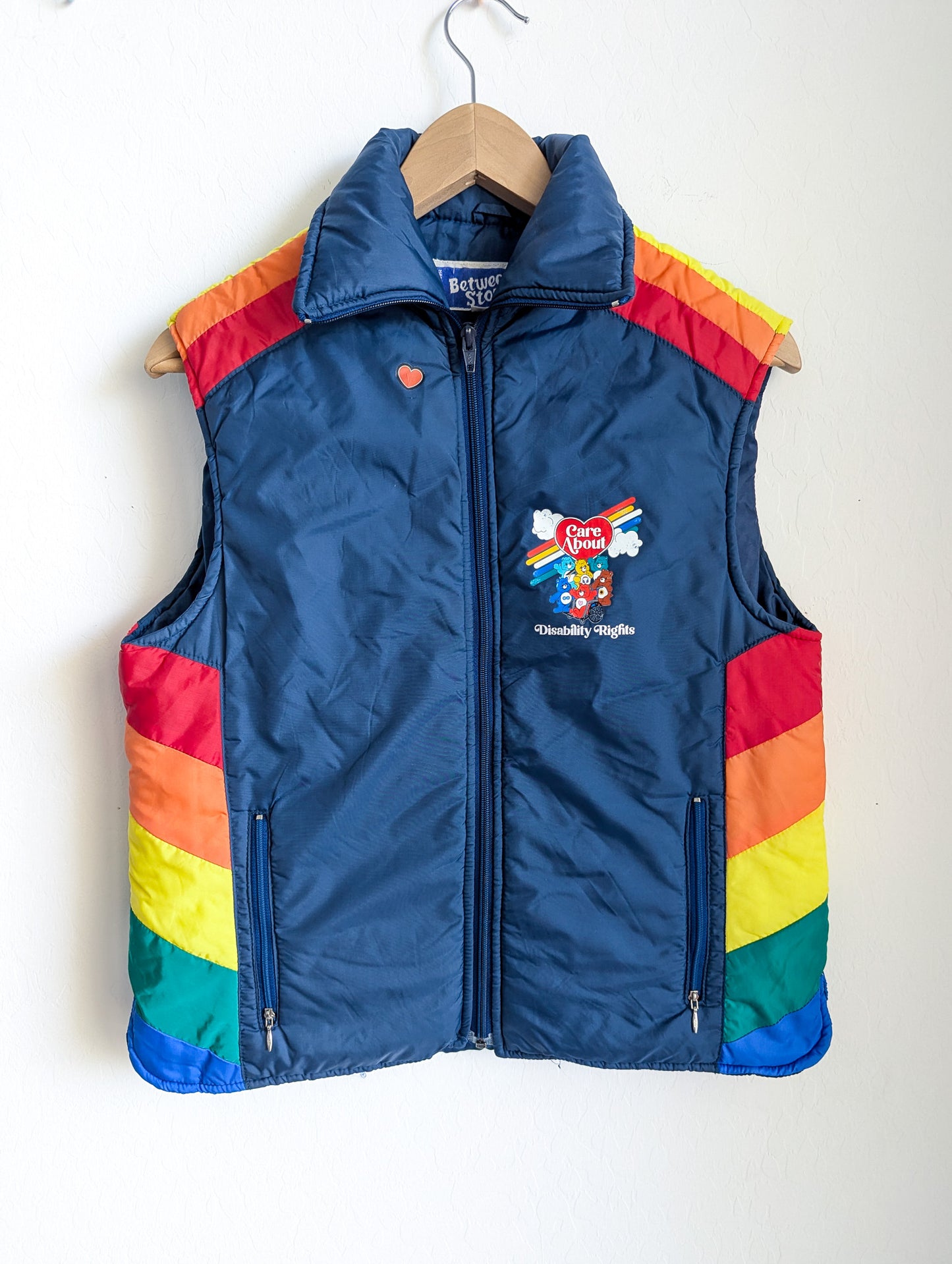 Care About Disability Rights - Adult Unisex VTG Rainbow Puffer Vest (S) - Repurposed Rebels
