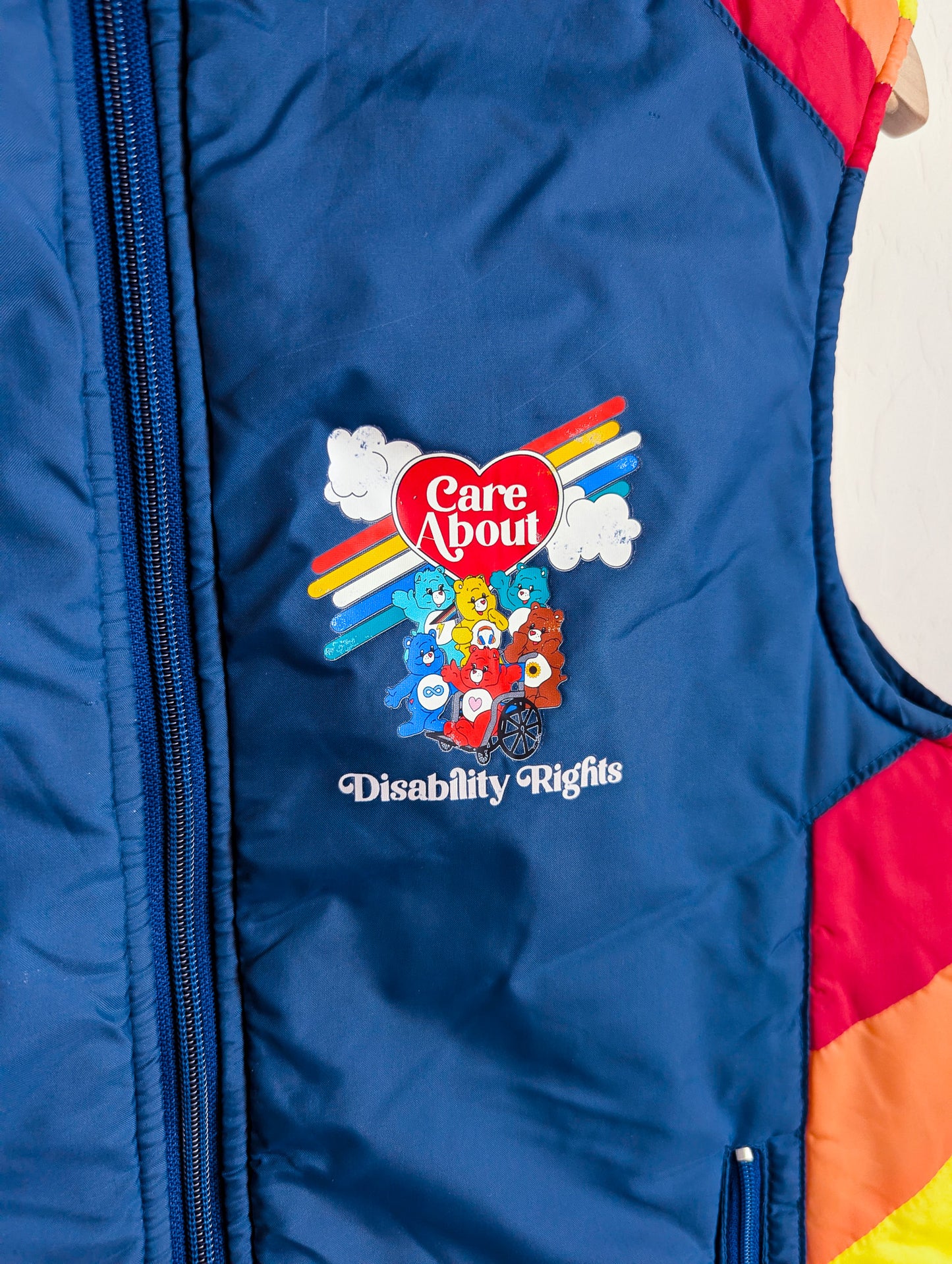 Care About Disability Rights - Adult Unisex VTG Rainbow Puffer Vest (S) - Repurposed Rebels
