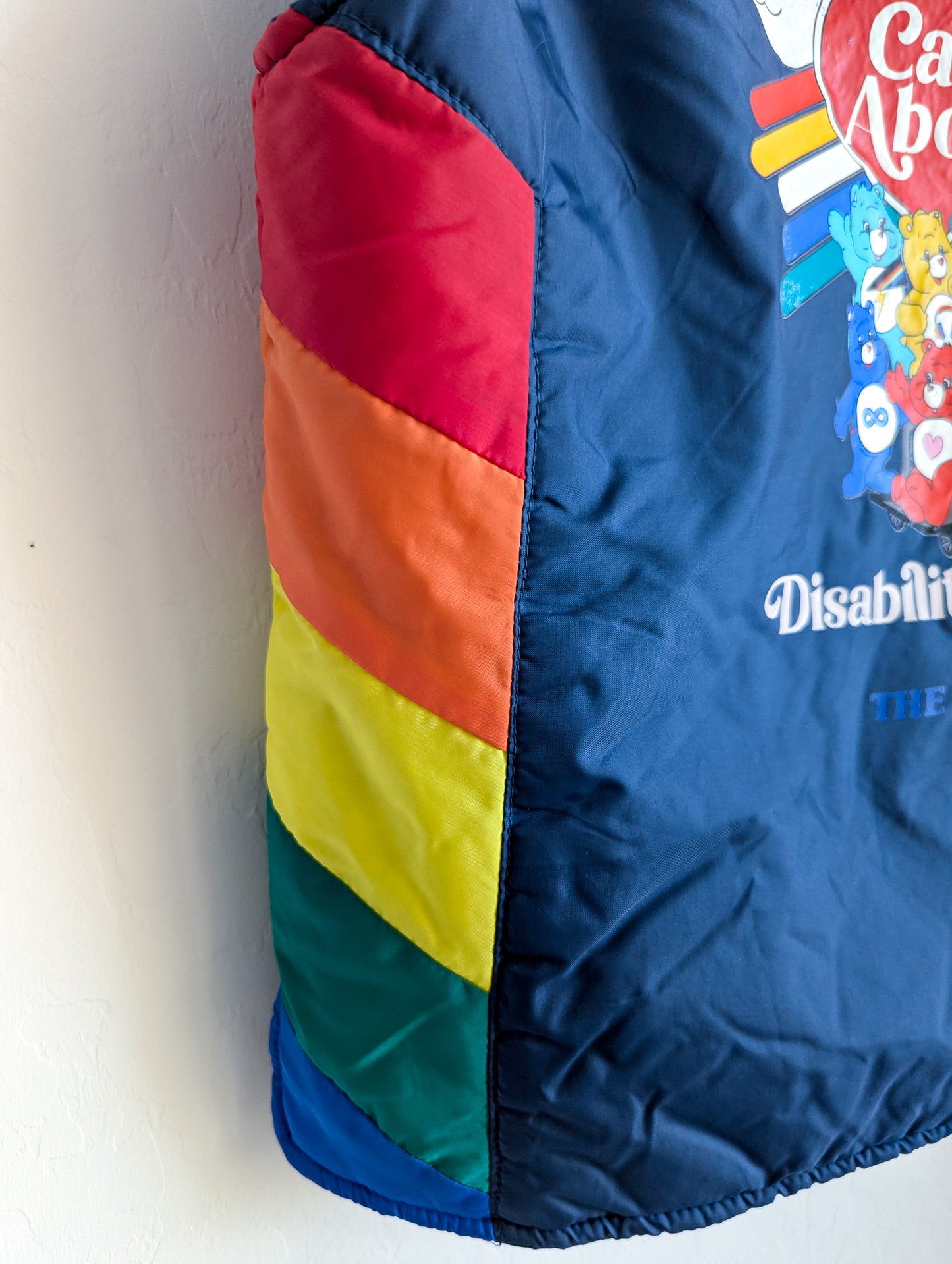 Care About Disability Rights - Adult Unisex VTG Rainbow Puffer Vest (S) - Repurposed Rebels
