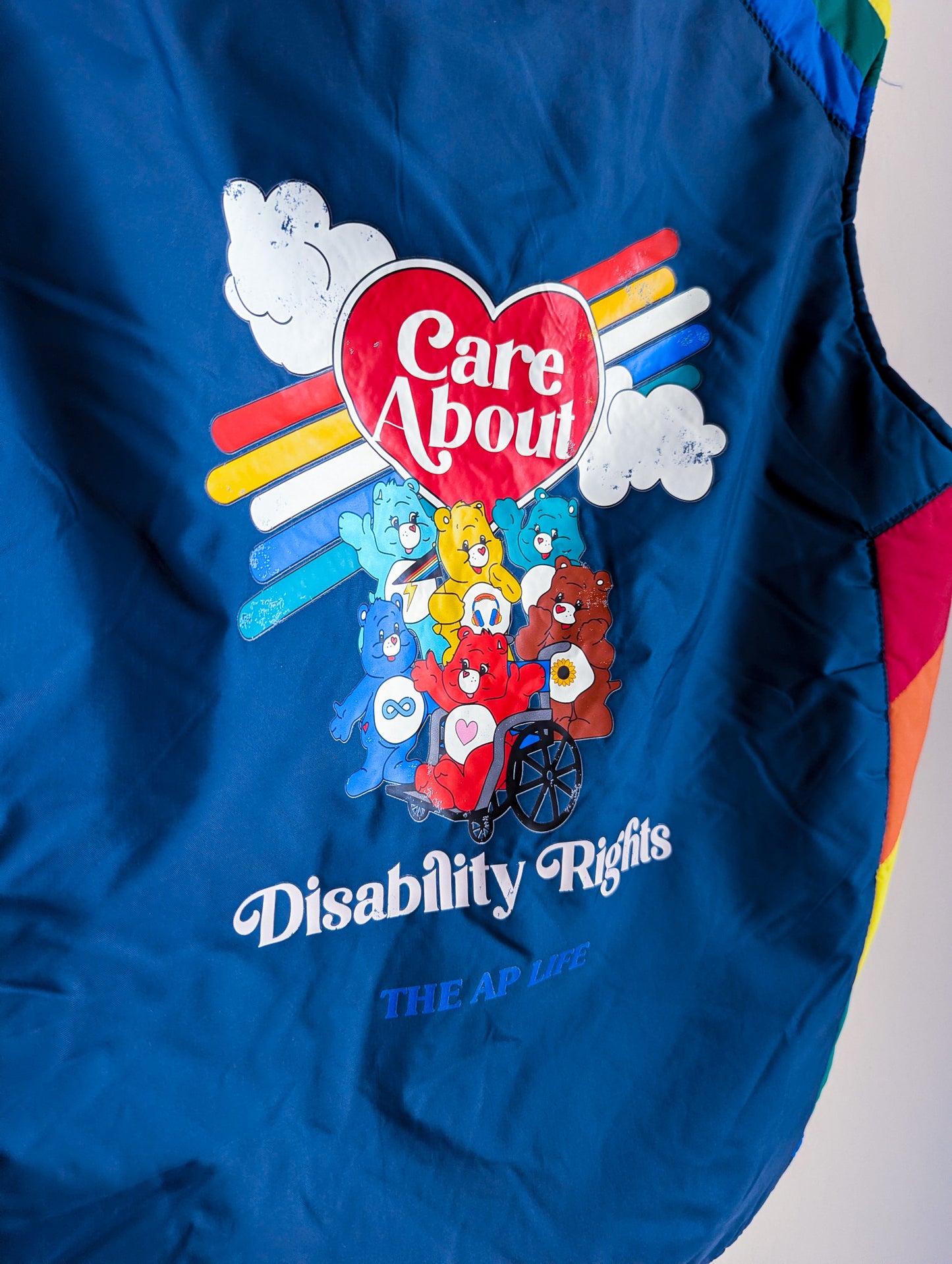 Care About Disability Rights - Adult Unisex VTG Rainbow Puffer Vest (S) - Repurposed Rebels