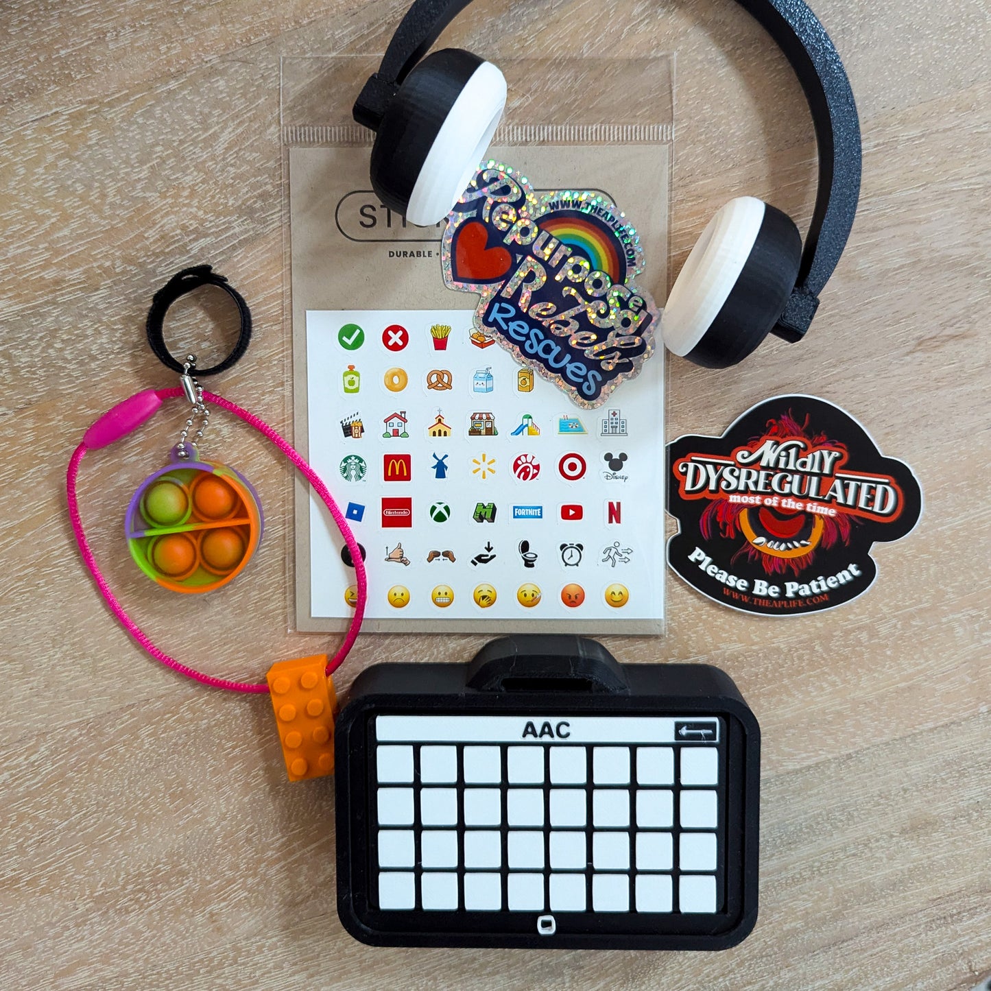 Adopt Animal - Includes Clacky AAC with Button Stickers, Advocacy Tee, Shoes, Headphones & Fidgets - RR Rescues